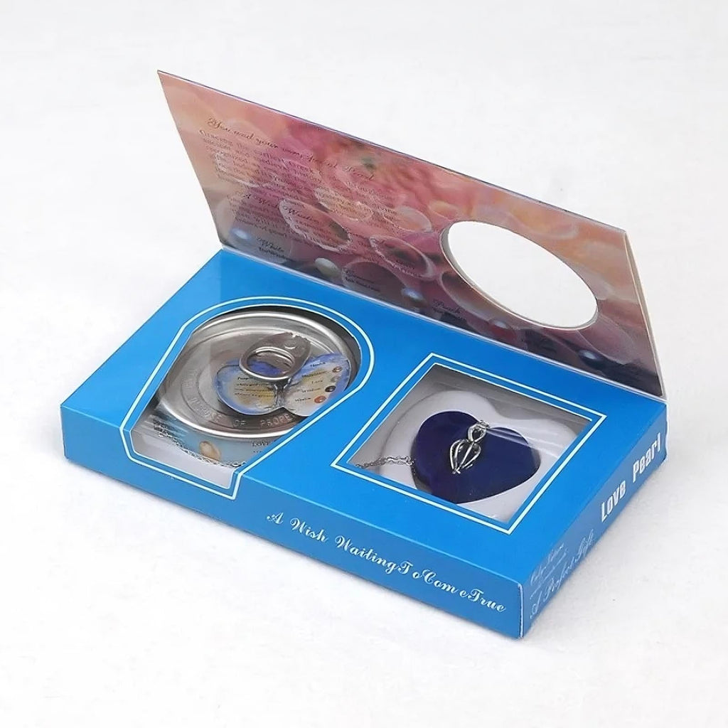 Perle naturelle dans sa coquille avec collier