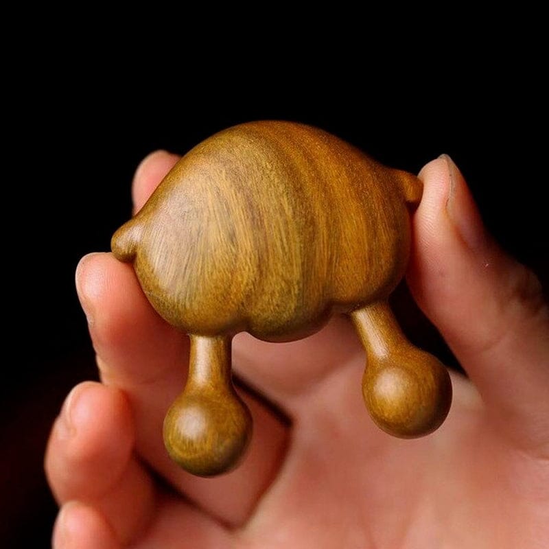 Ansiktsmassageverktyg i trä