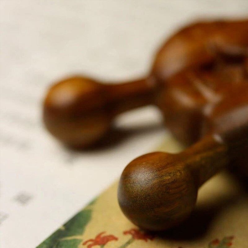 Ansiktsmassageverktyg i trä