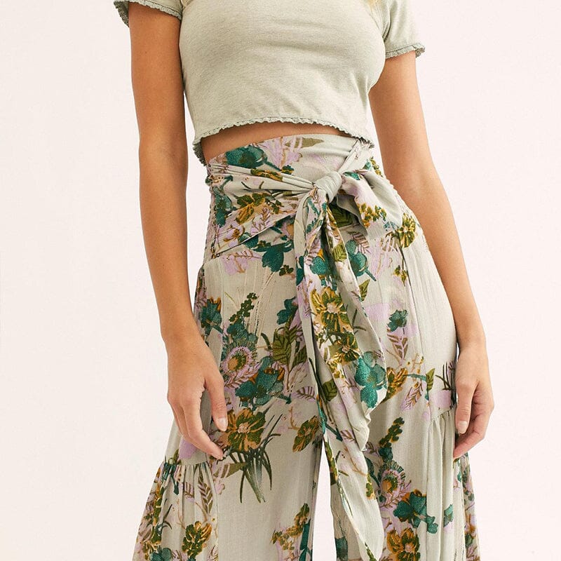 Blommiga avslappnade spetsbyxor med vida ben