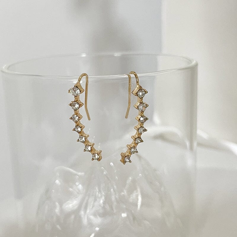 Örhänge med sju stjärnor och diamanter